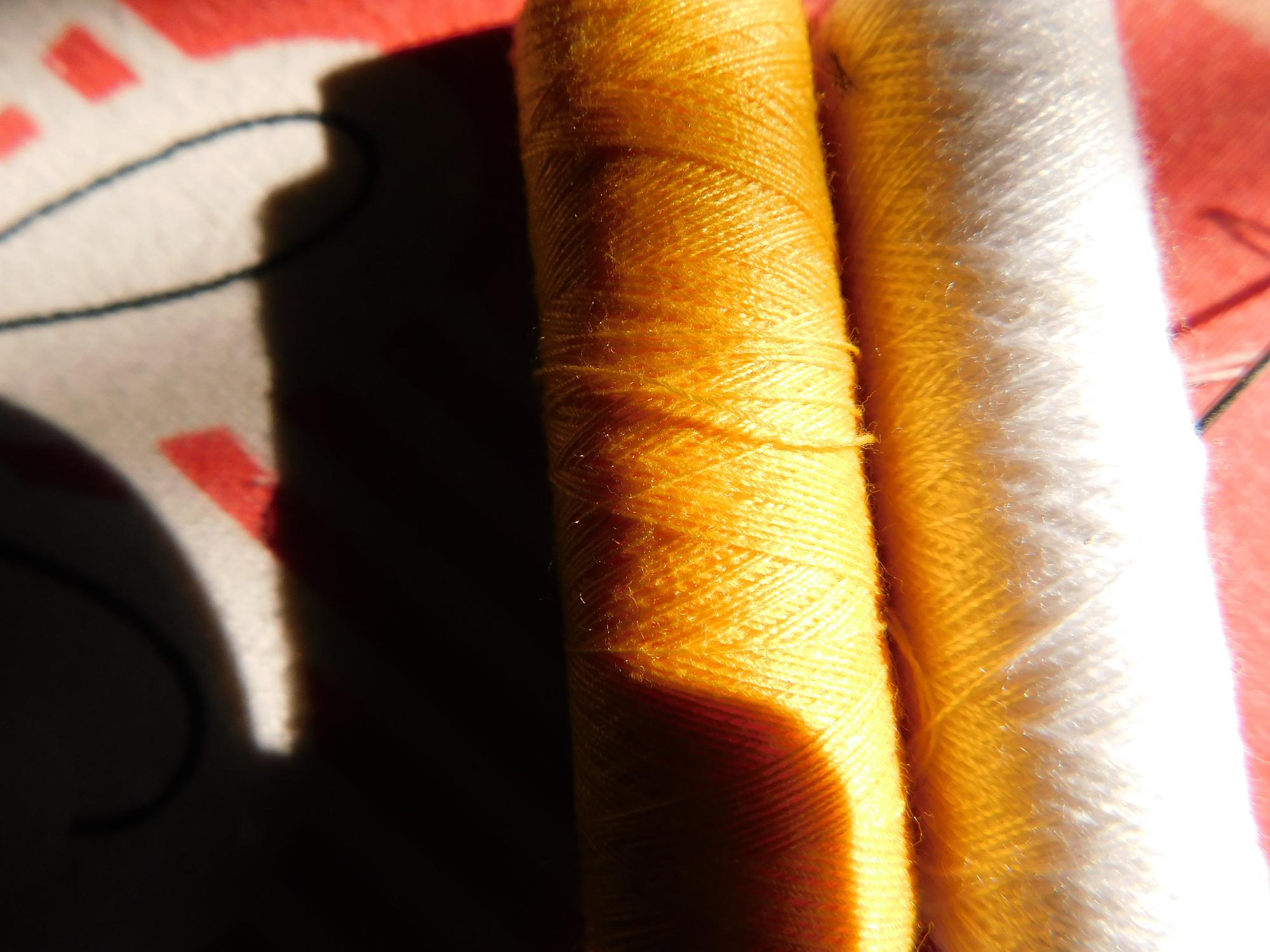 Close-up of detailed embroidery on linen