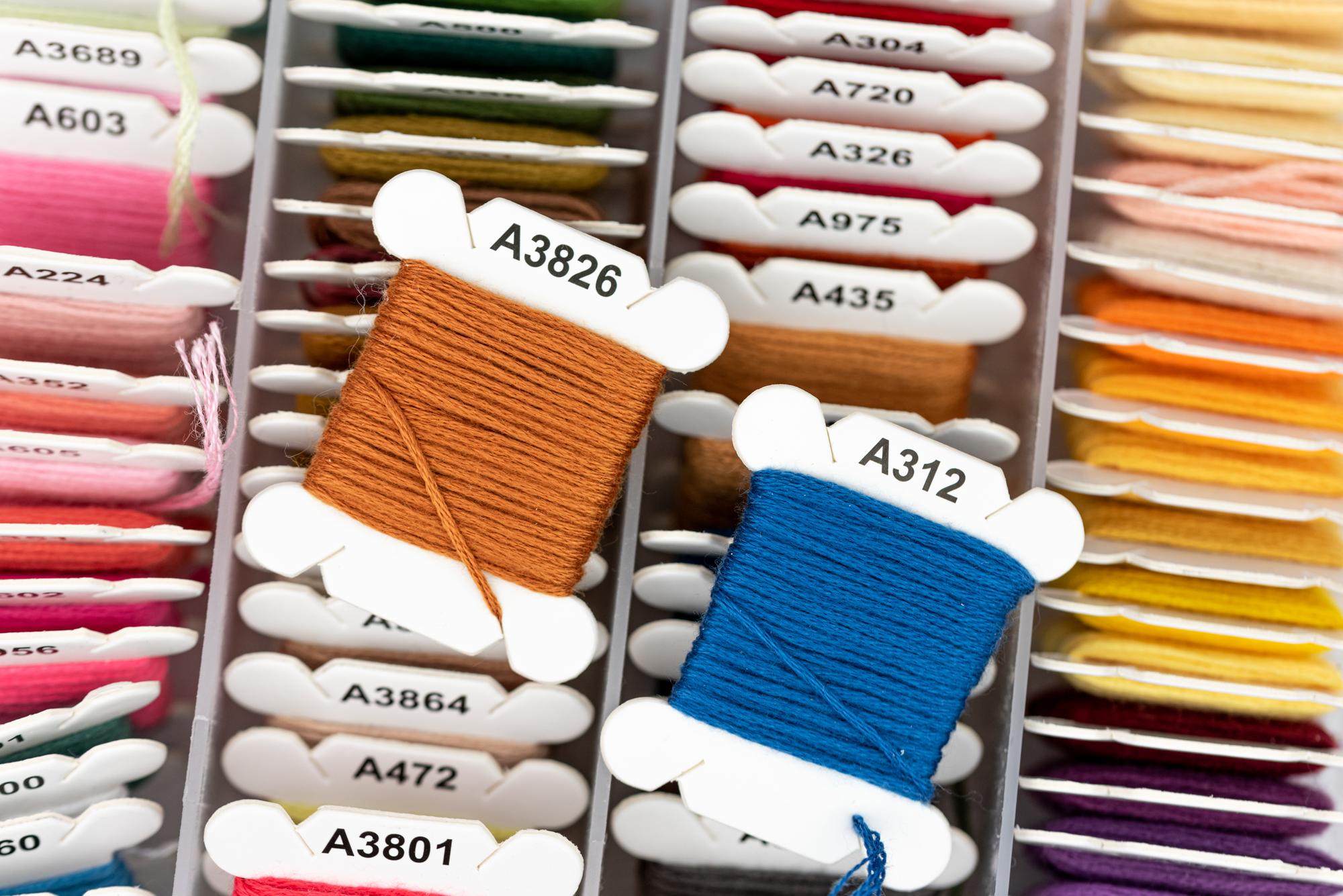 Samples of embroidered badges and textiles